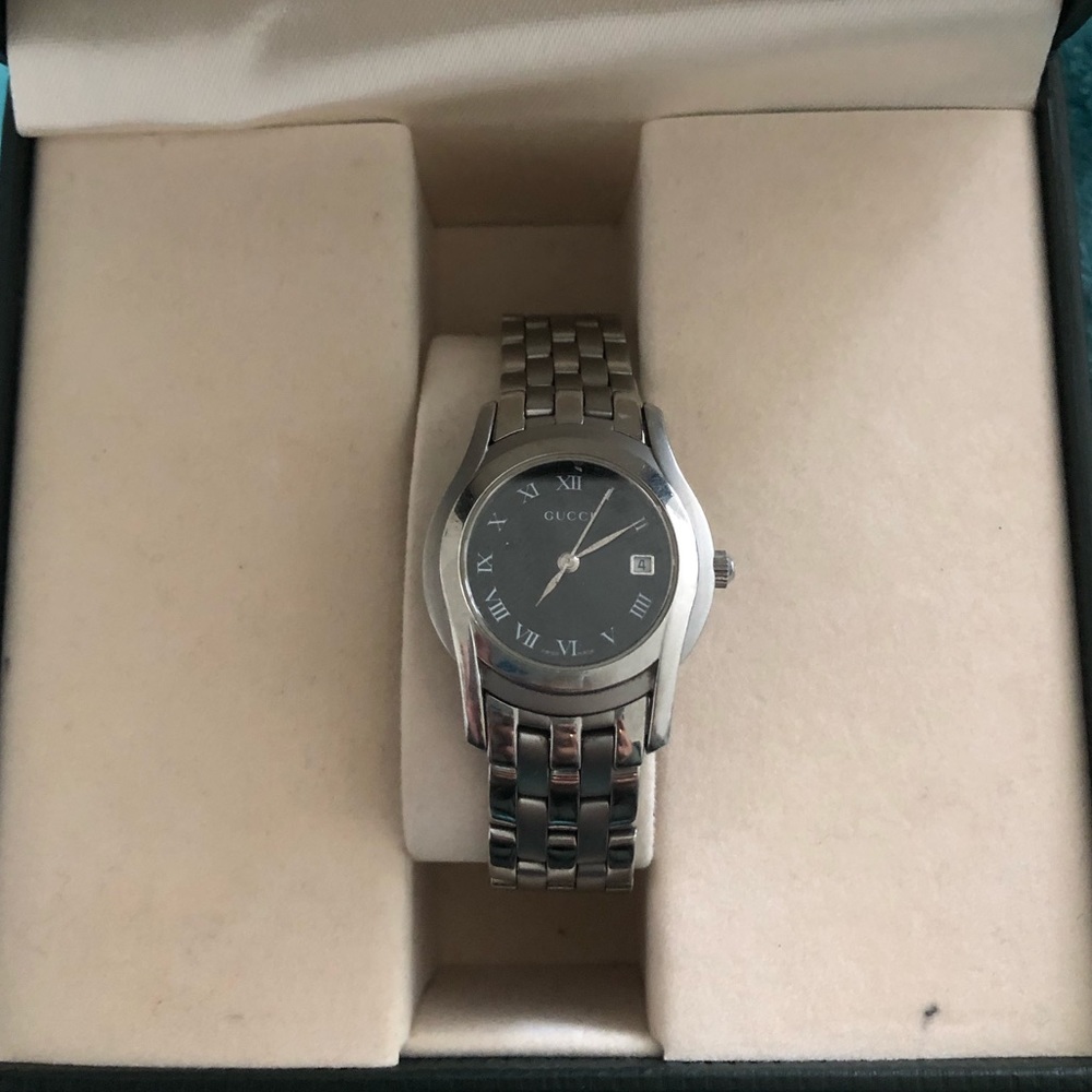 Silver Gucci watch